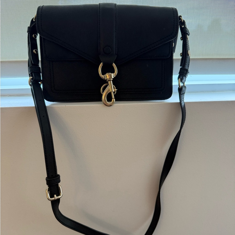 Rebecca Minkoff Black and Gold Crossbody Bag with Structured Design
